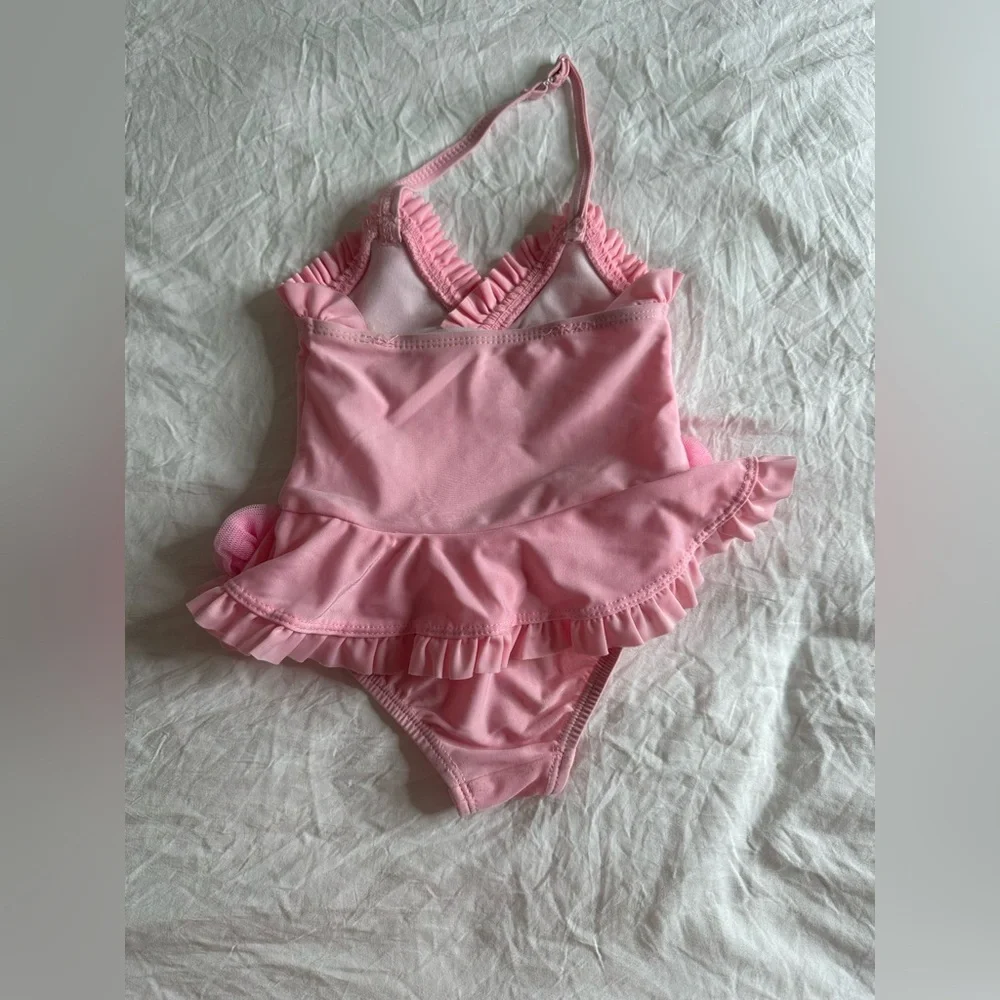 Baby pink swimsuit size 6-9 months
